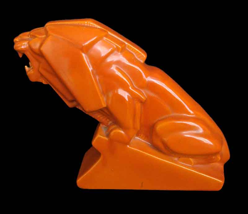 Percy Metcalfe Percy Metcalfe Lion of Industry in orange.